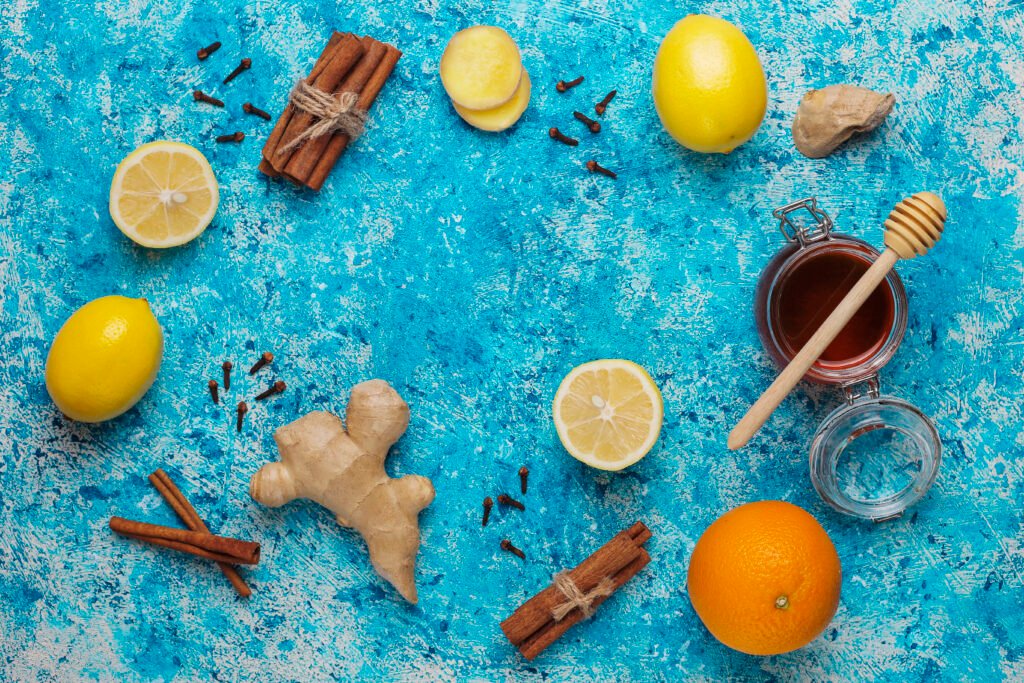 Natural immune-boosting ingredients including citrus fruits, ginger, garlic, and honey